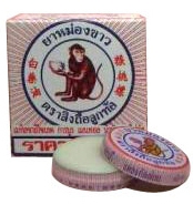 White Monkey Holding Peach Balm